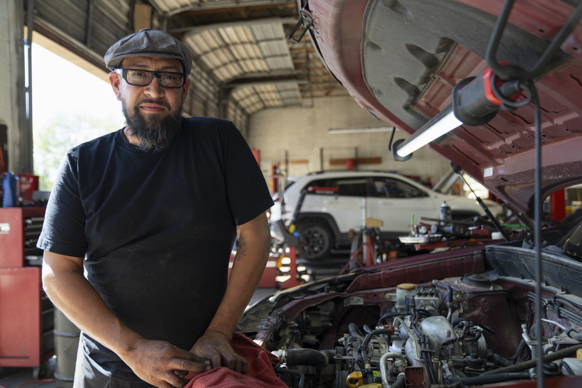 Adam Griego in Adam's Automotive garage