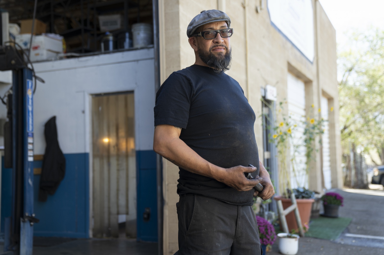 Adam Griego outside his automotive shop